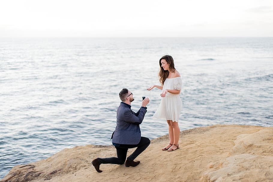 man, proposing, woman, cliff, ocean, daytime, people, couple, girl, propose