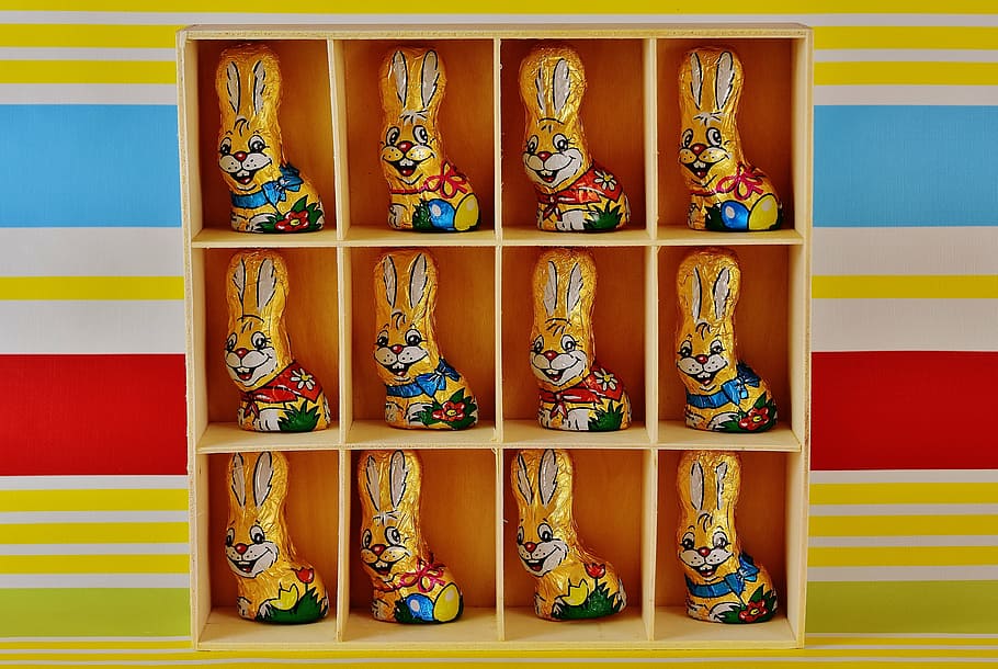 rabbit figurine lot, cubby shevles, chocolate bunnies, easter, easter bunny, candy, happy easter, easter theme, sweetness, delicious