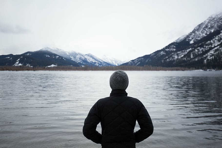 person, wearing, black, jacket, standing, body, water, gray, beanie, guy