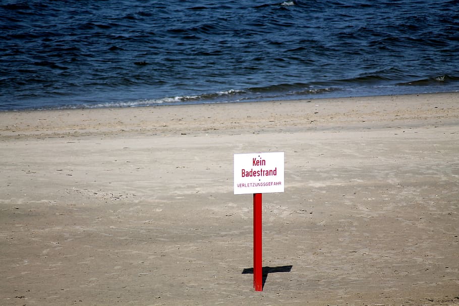 shield, note, beach, coast, prohibited, communication, sign, water, land, warning sign
