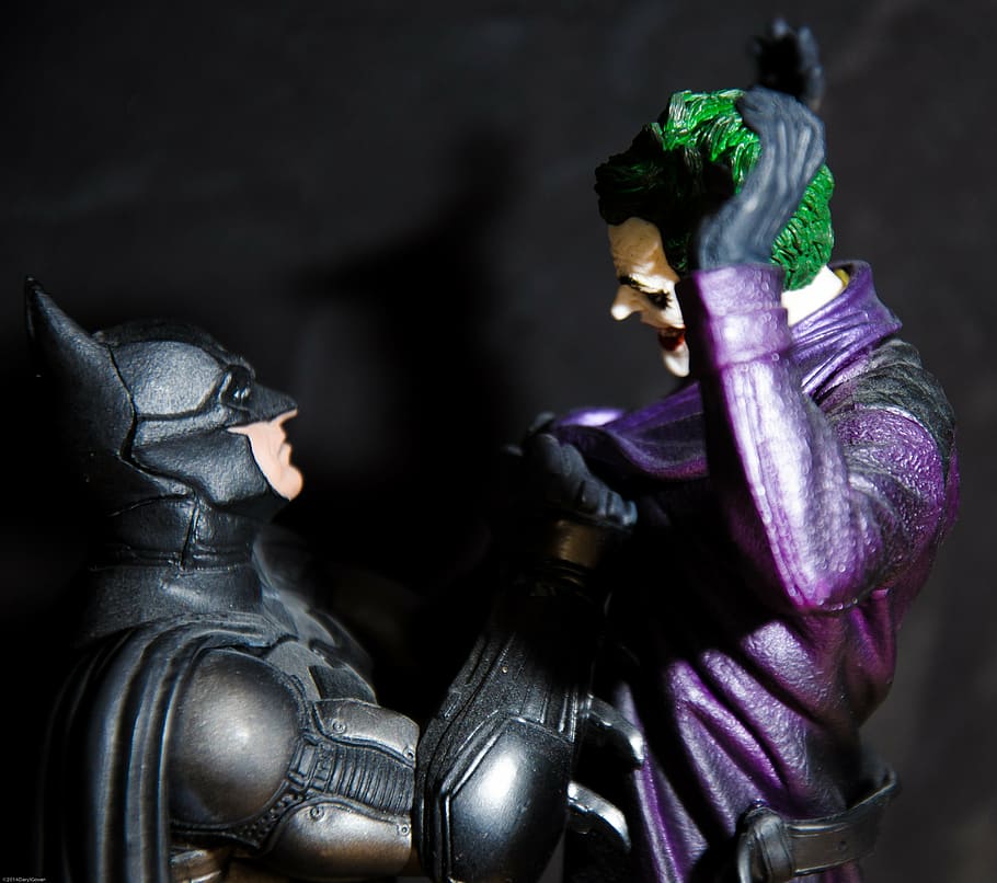close-up photo, batman, joker action figures, joker, cartoon, figurine, people, character, toy, dark