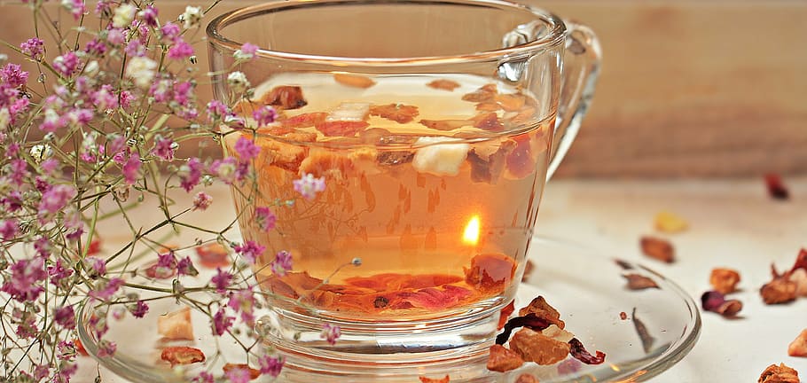 filled, clear, glass teacup, saucer, flower petals, tee, teacup, cup, drink, hot drink