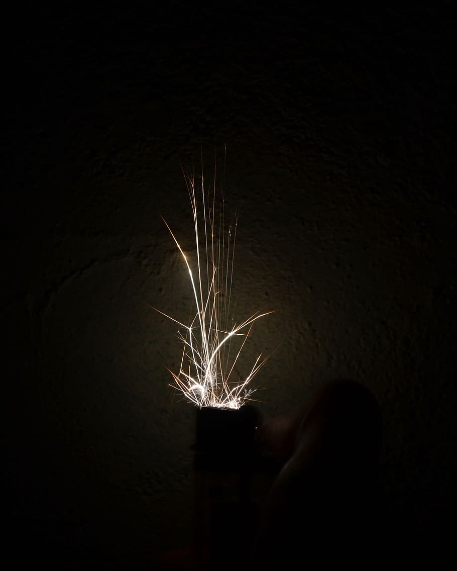 hand lighter, lighter, dark, night, hot, yellow, energy, sparks, firework - man made object, illuminated