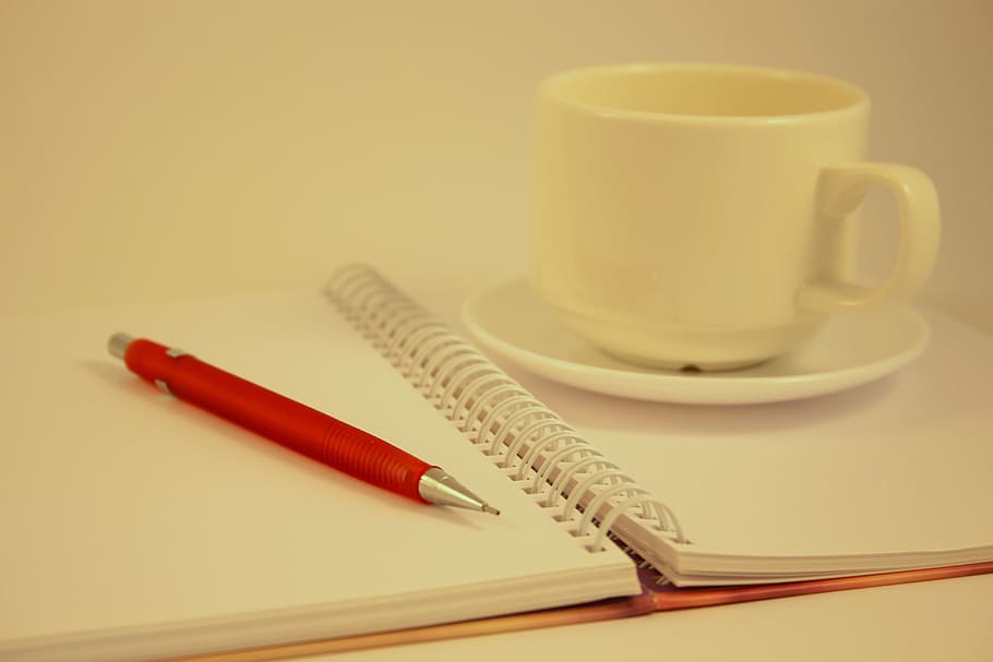 white, ceramic, teacup, saucer, top, opened, notebook, red, mechanical, pencil