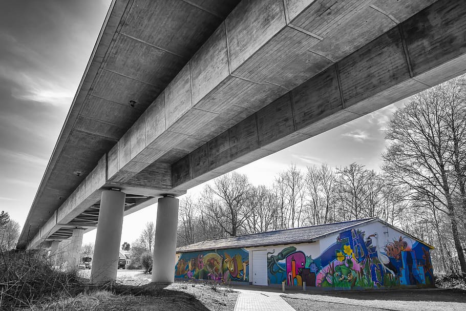 architecture, transport system, road, bridge, house graffiti, built structure, bridge - man made structure, connection, architectural column, sky