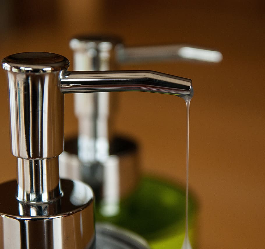 soap, bottle, liquid soap, toilet, food and drink, metal, close-up, indoors, household equipment, focus on foreground