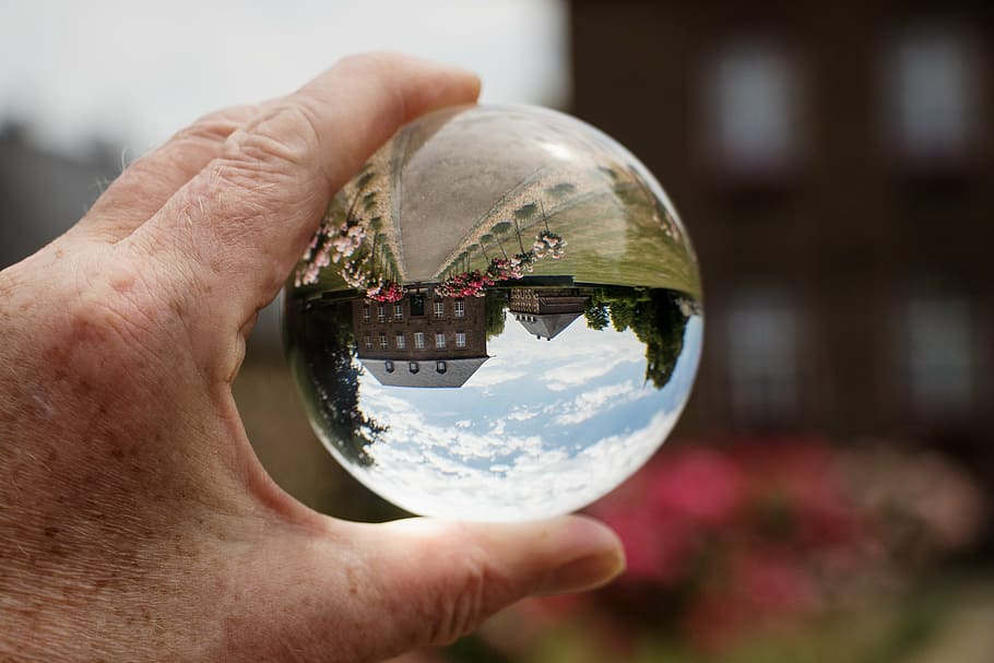 glass ball, glass ball photo, mirroring, town hall, architecture, building, historically, niederzier, human hand, holding