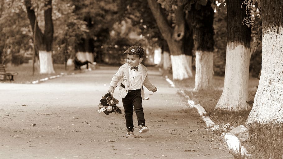 gray, scale photo, boy, wearing, formal, outfit, child, bouquet, flowers, park