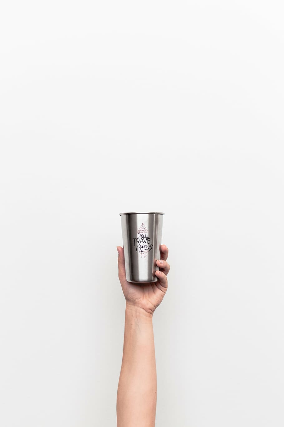 person, holding, gray, travel, stainless, steel drinking cup, white, background, bottle, mug