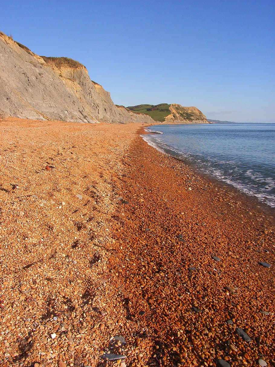 beach, pebbles, cliffs, chideock, south west dorset, jurassic coast, england, coastline, sky, clear sky