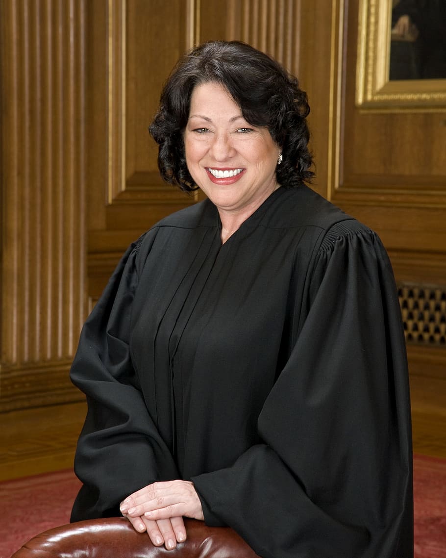 woman, wearing, black, long-sleeved, dress, smiling, judge, court, justice, law