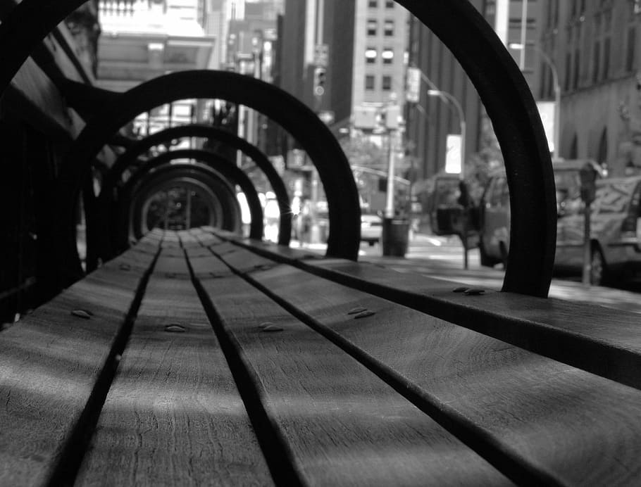 grayscale photo, tunnel, grayscale, brown, wooden, bench, wood, city, street, sidewalk