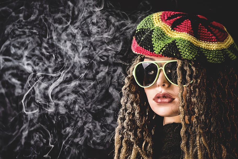 woman, smoke pot, smoking, drugs, smoke, stoner, rasta lure, cap, sunglasses, colorful