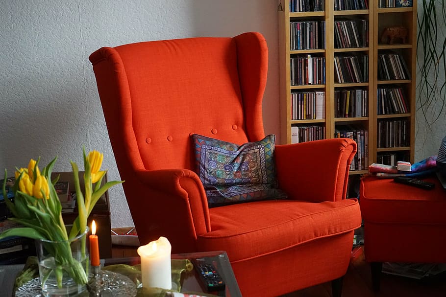 orange armchair, chair, ears armchair, furniture pieces, seating area, cozy, red, pillow, seat, rest
