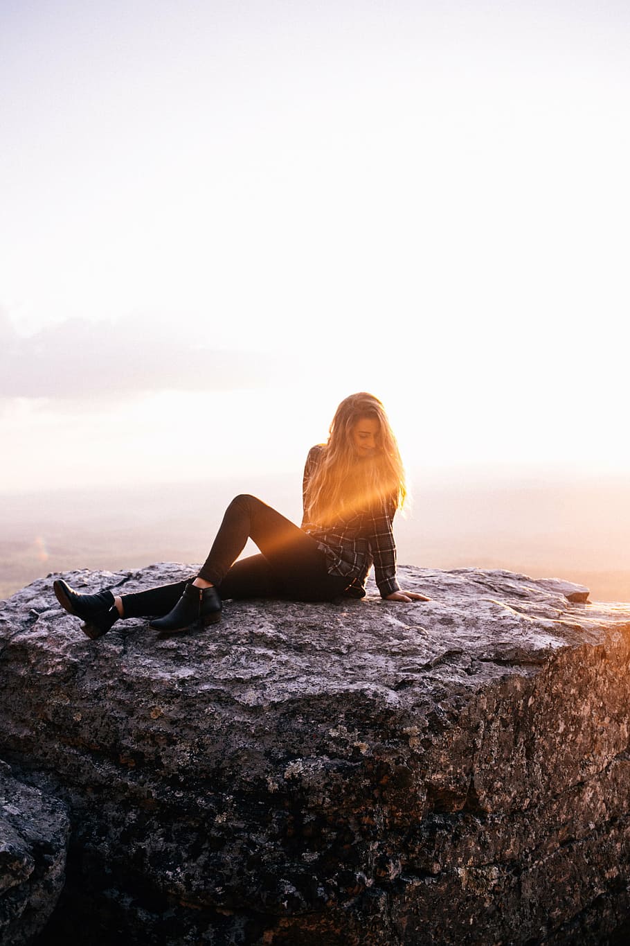 woman, wearing, black, leggings, sitting, rock, day, nature, cliff, sun