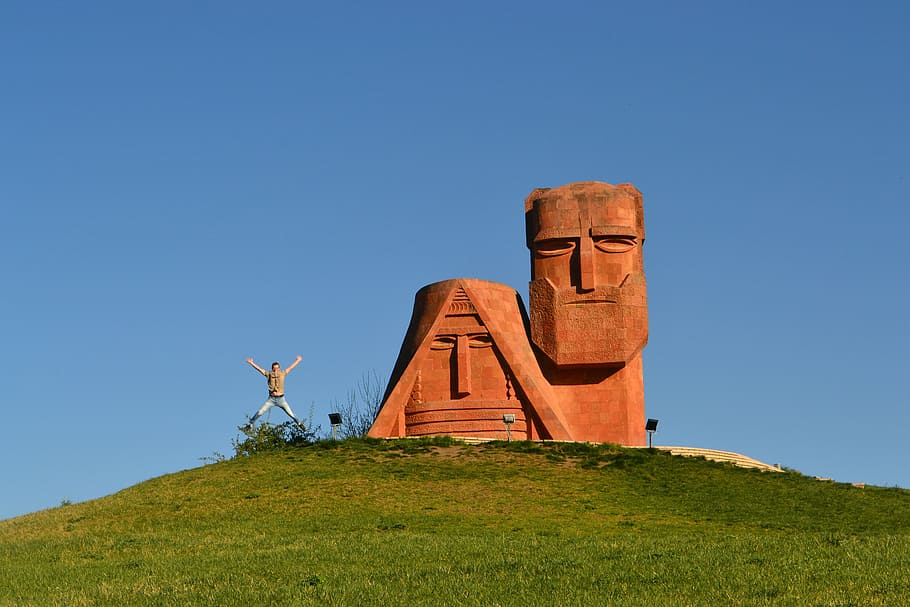 stele, nagorno-karabakh, stepanakert, grandma and grandpa, orange tuff, sculpture, blue, sky, architecture, travel destinations