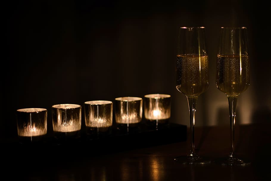 stock photo, two, wine glasses, votive, candles, votive candles, champagne, new year, party, drinking