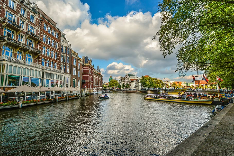 concrete, buildings, river, boats, white, clouds, blue, sky, daytime, amsterdam