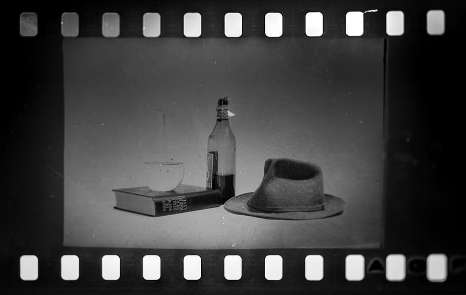 black and white, slide, hat, booze, liquor, book, glass, film strip, negative, 1960