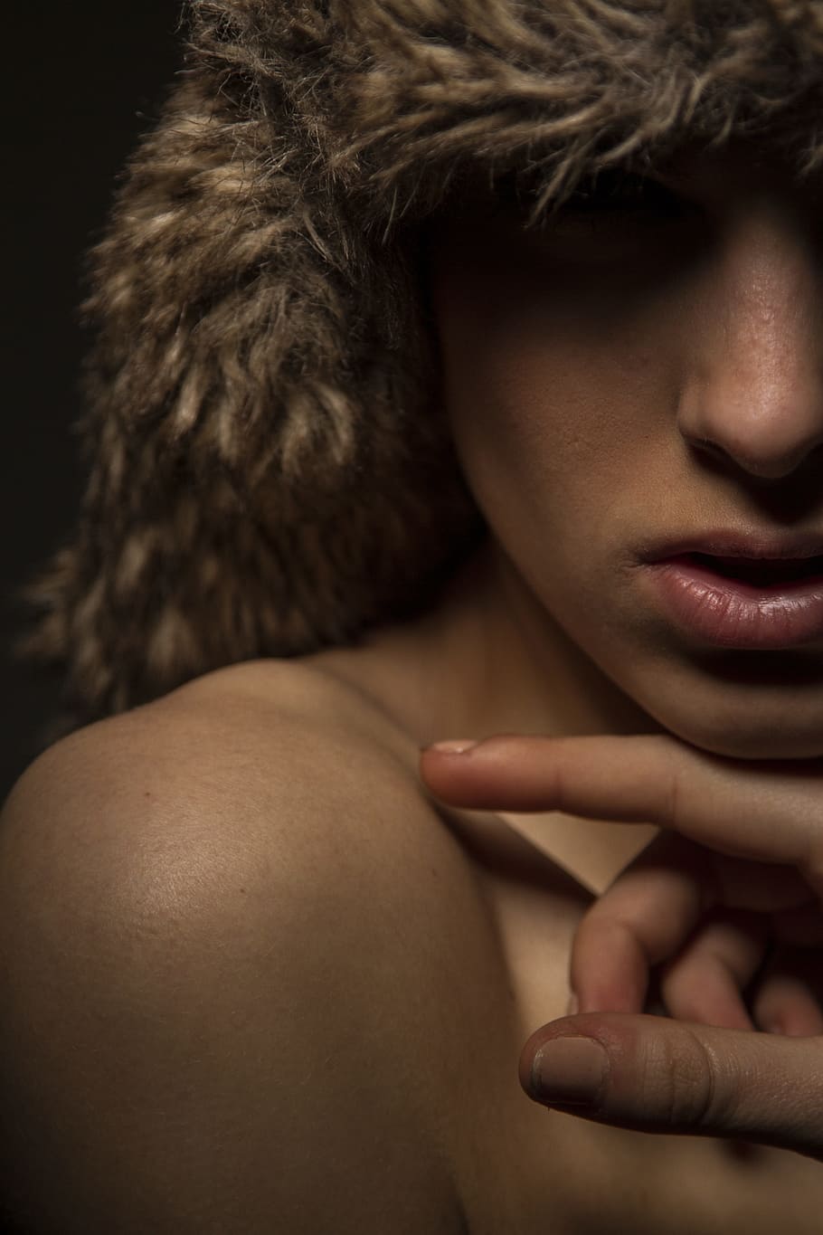 woman, touching, shoulder, index finger, brown, wearing, fur hat, fur, hat, women's