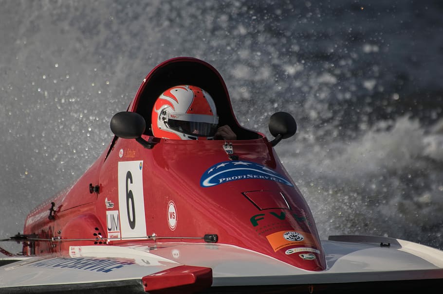 person riding vehicle, powerboat, racing boat, motor boat race, race car driver, vehicle, water, wild, water sports, speed