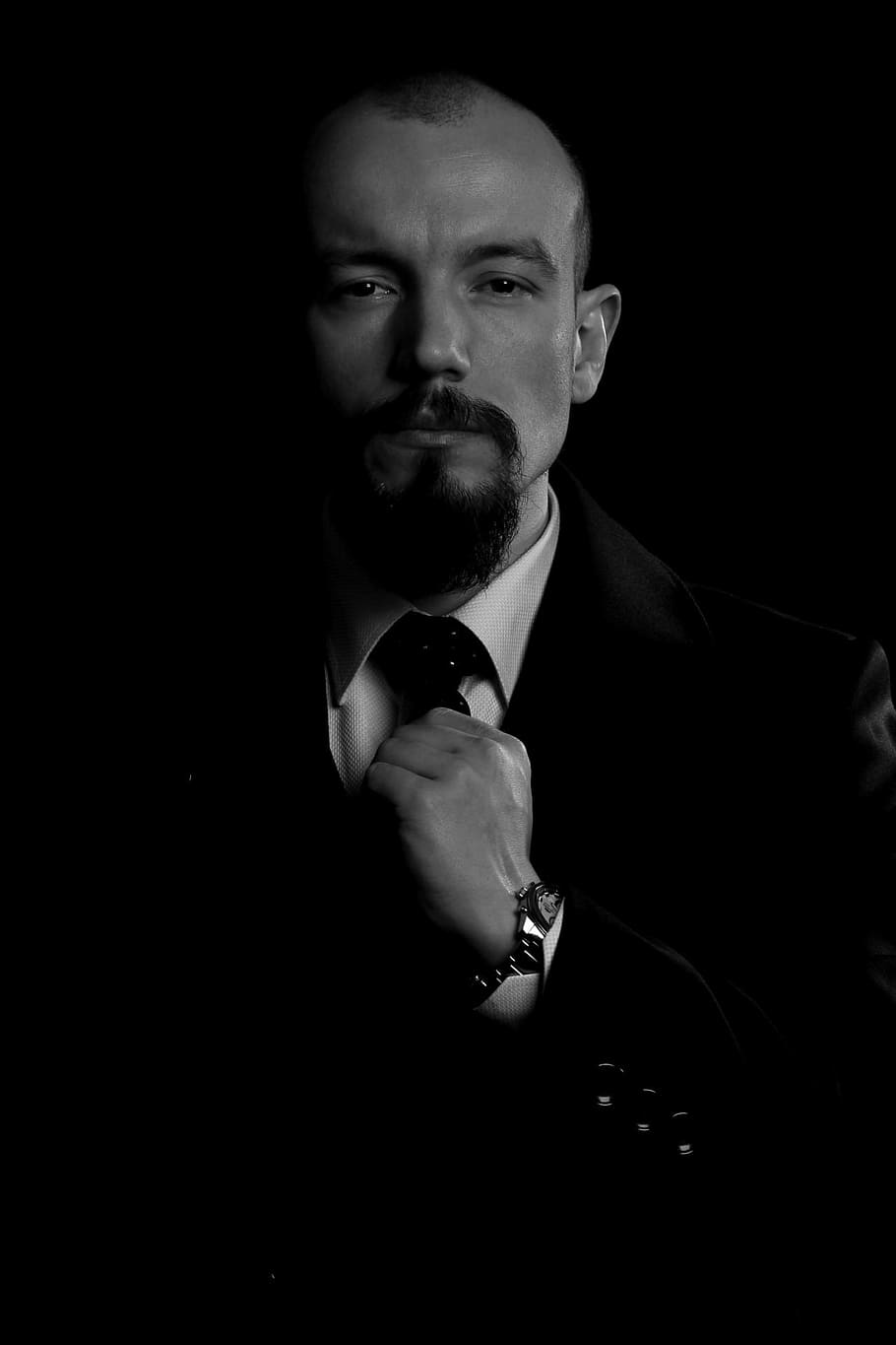 man, suit jacket, holding, necktie, grayscale photography, history, globalism, spiritual, age, boldness