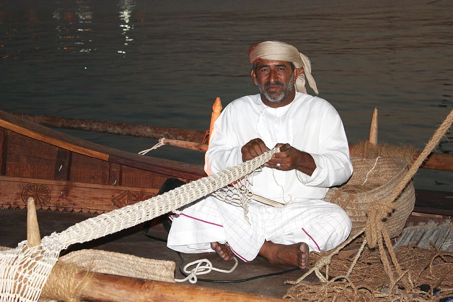 dhow, doha, nets, fisherman, one person, sitting, front view, men, adult, real people
