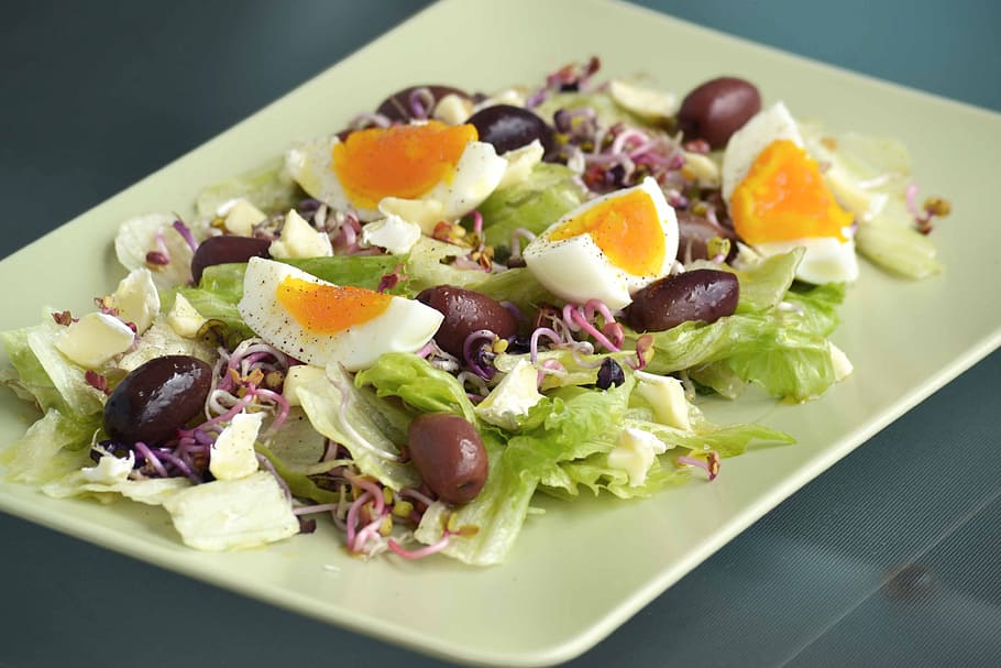 rectangular, white, plate, vegetable salad, topped, sliced, hard, boiled, egg, hard boiled egg