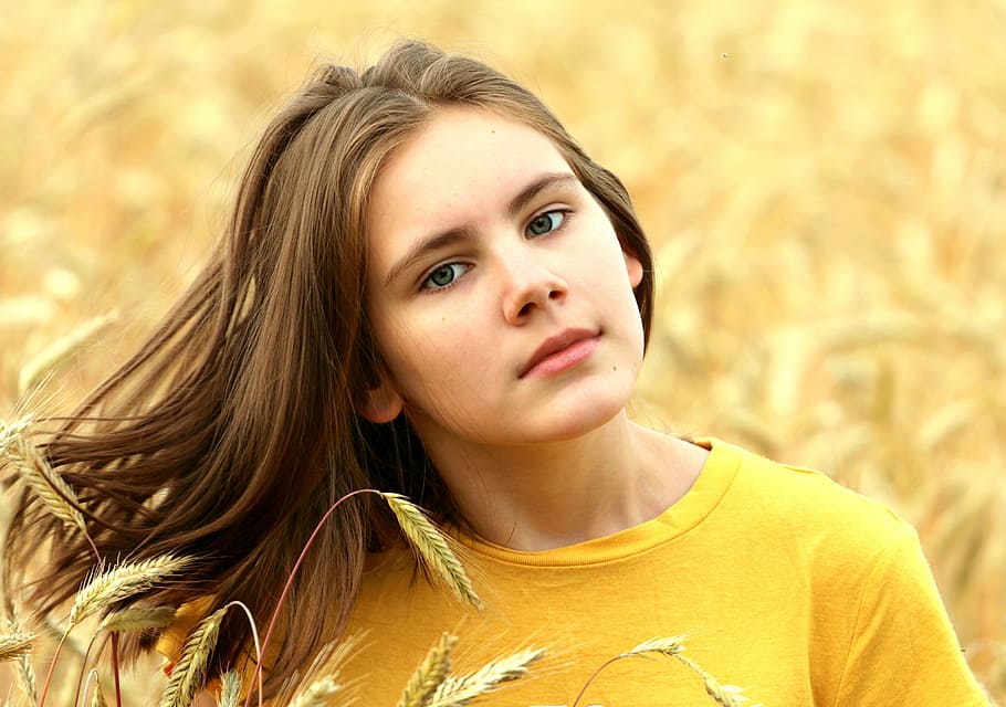 woman, yellow, crew-neck shirt, surrounded, petaled flowers, girl, hair, field, wheat, abundance
