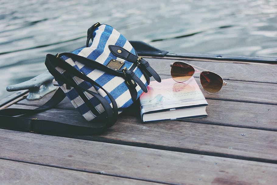 brown, sunglasses, top, book, white, blue, leather, bag, near, river