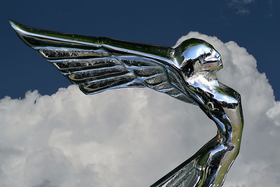 car mascot, flying lady, metal, sculpture, sky, cloud - sky, nature, day, low angle view, outdoors