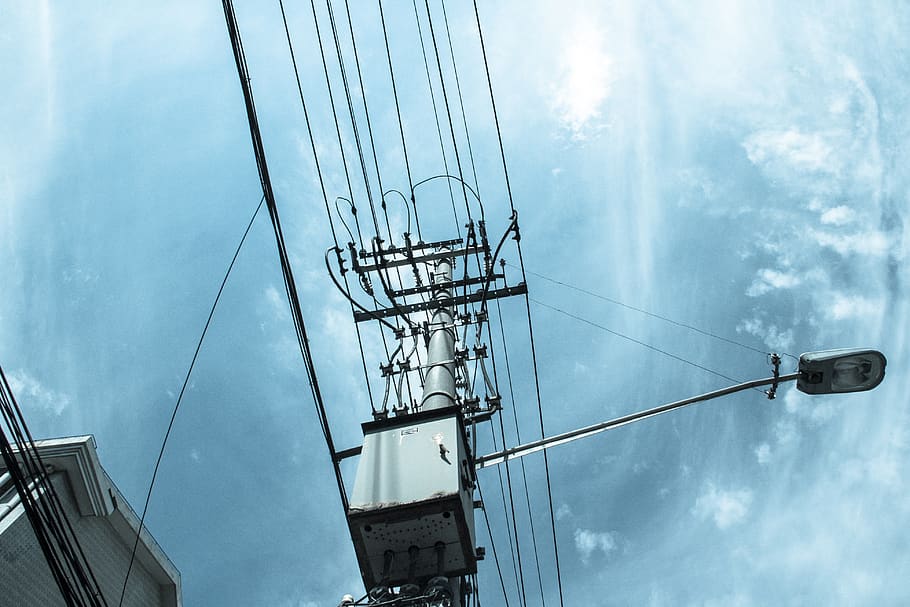 telephone poles, cloudy day, sky, look, street lamp, cable, low angle view, electricity, connection, fuel and power generation
