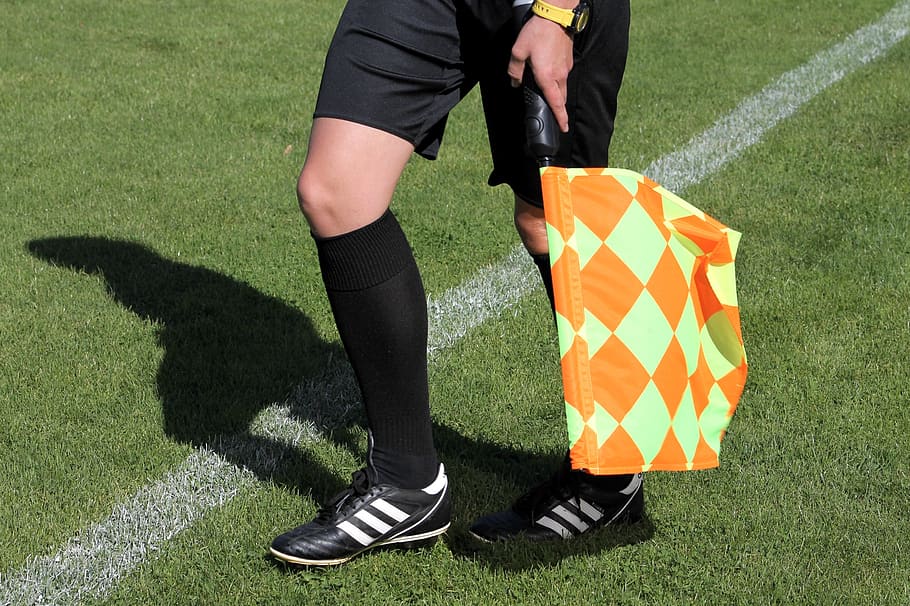 football, referee, lin, sport, official, football match, football referee, low section, grass, human leg