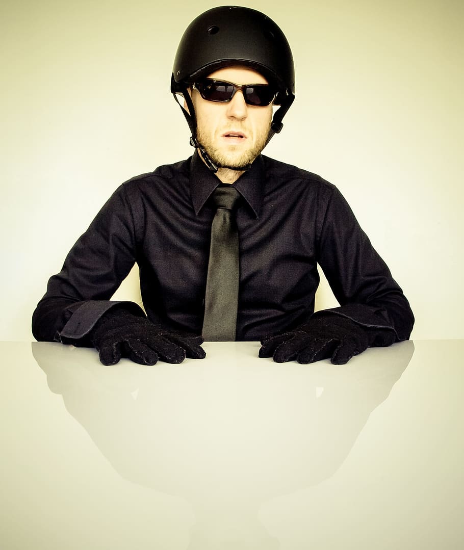 man, wearing, black, bicycle helmet, dress shirt, front, table, businessman, tie, shirt