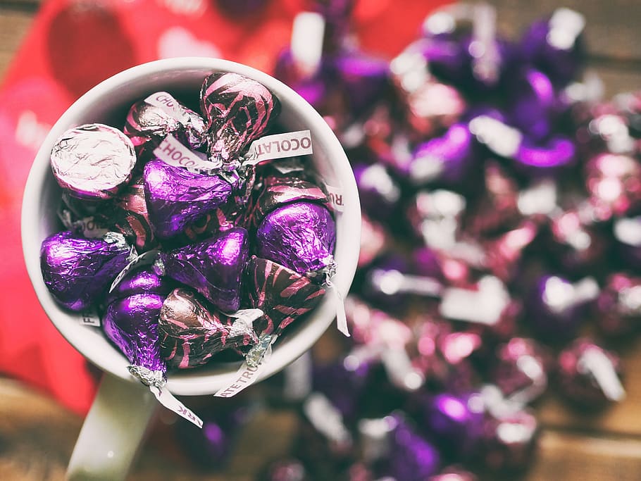 chocolate, sweet, kisses, violet, brown, wrapper, collection, mug, close-up, focus on foreground