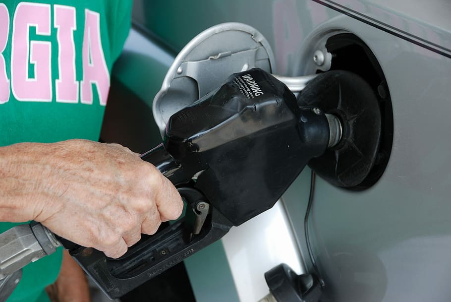 person, holding, black, gas nozzle, Pumping Gas, Fuel, Pump, Industry, fuel, pump, gas