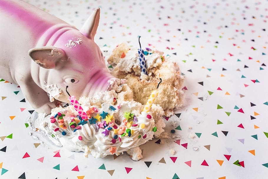 white, pink, ceramic, pig figurine, eaten, cake, pig, figurine, whimsical, lazy