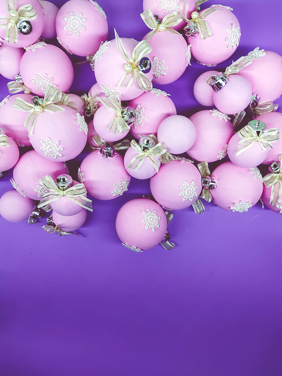 flat lay, christmas spheres, pink, white and purple background, xmas and new year holiday, pink color, indoors, freshness, purple, high angle view