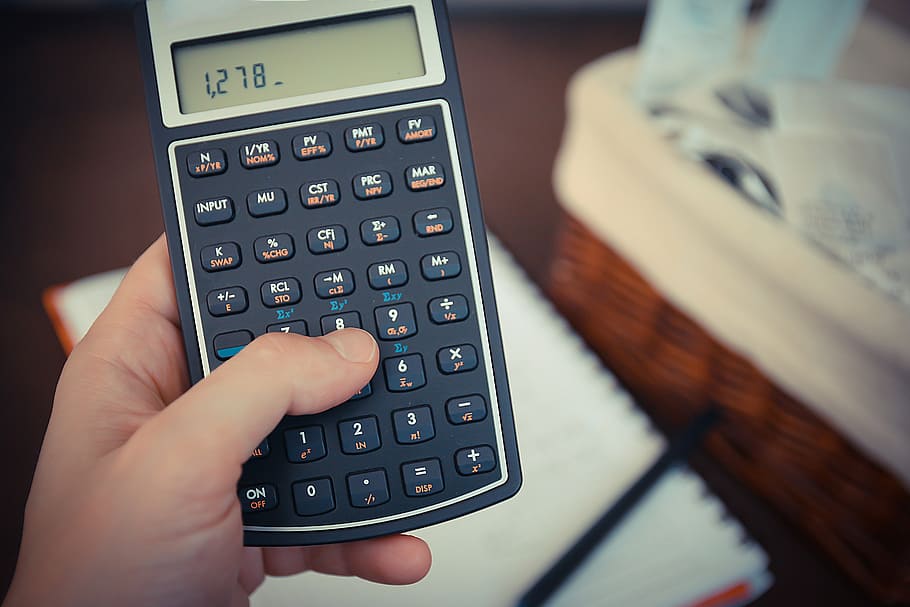person, holding, black, calculator, money, bills, save, savings, taxes, business