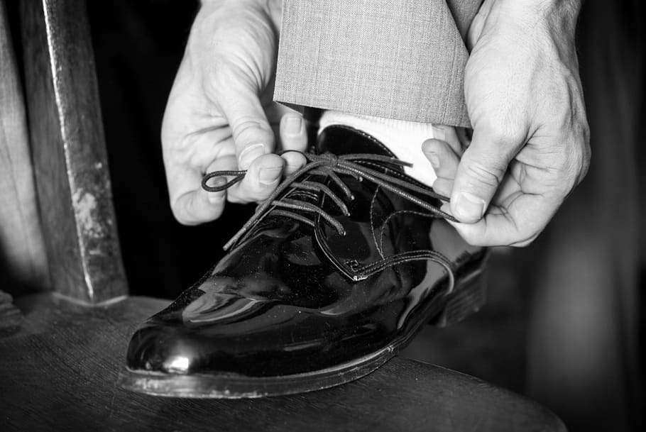 greyscale photo, dress shoe, wedding, shoes, shoe, tying shoe, man, wedding shoes, one person, adult