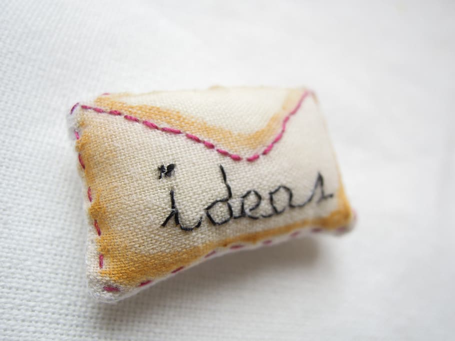 brooch, miniature, ideas, letter, occurrence, thinking, notion, indoors, textile, studio shot