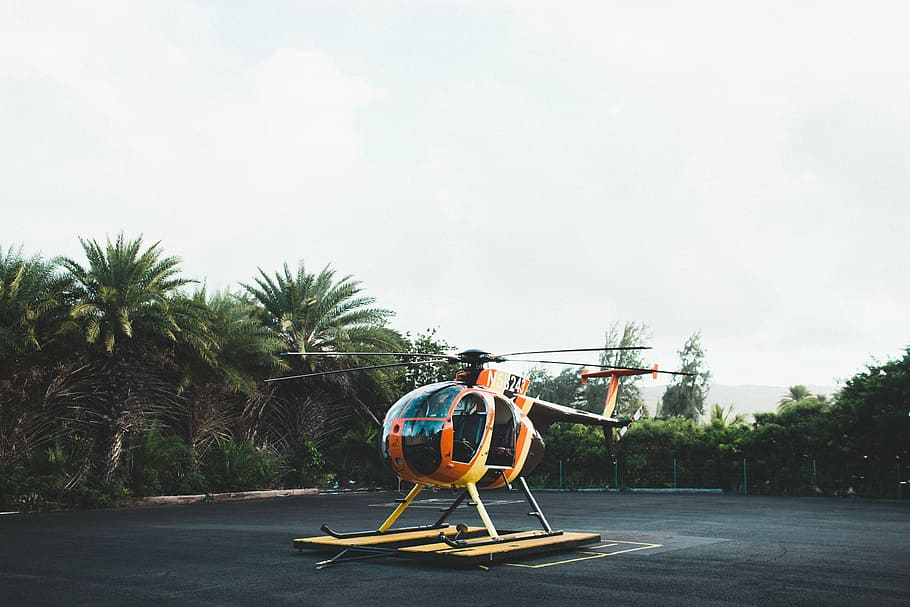 orange, black, helicopter, land, chopper, helipad, transportation, transport, aircraft, fly