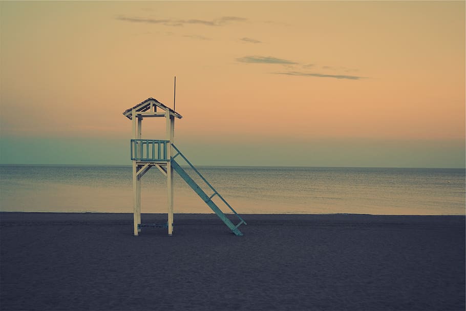 beach, sunset, dusk, sand, shore, ocean, sea, lifeguard tower, water, sky