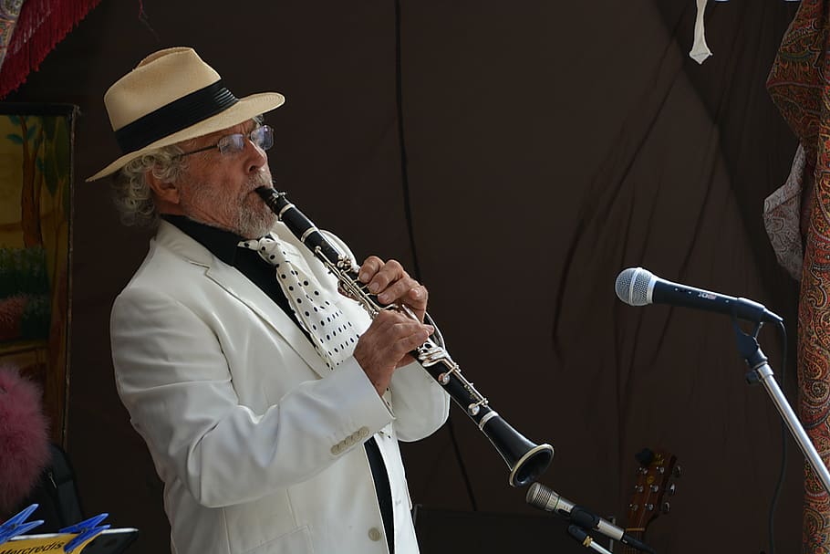 bearded, man, wearing, fedora hat, playing, flute, front, microphone, clarinetist, clarinet