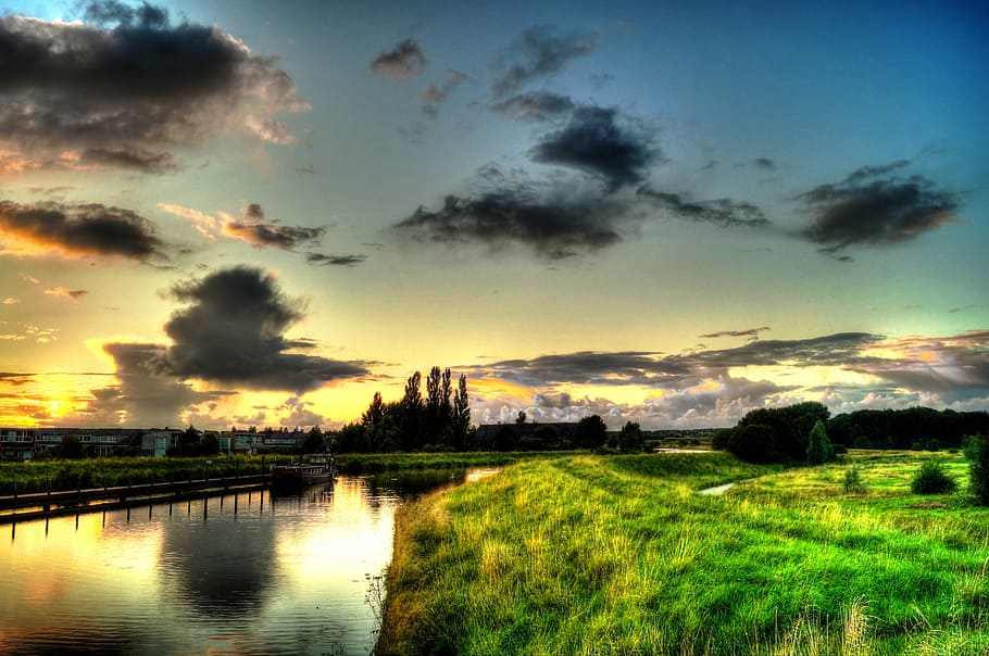 landscape photography, castle, body, water, green, grass, near, sunset, sky, dawn