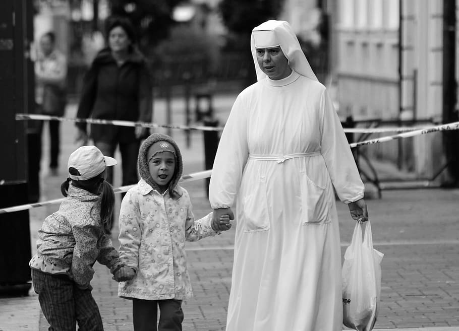 the nun, children, laughter, people, women, group of people, real people, child, togetherness, traditional clothing
