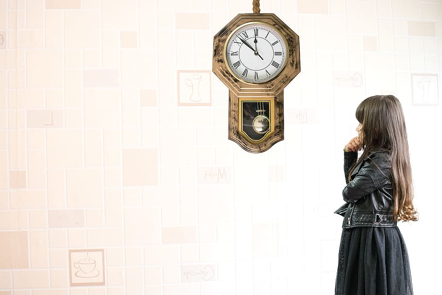 woman, wearing, black, leather jacket, standing, pendulum clock, girl, kid, attractive, student