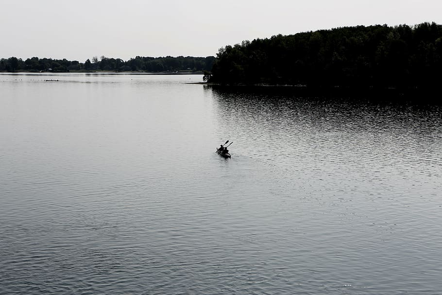 grayscale photo, boat, body, water, black, near, island, canoe, kayak, paddle