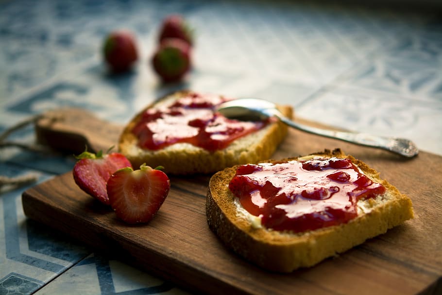 jam, sandwich, strawberry, fork, table, food, food and drink, fruit, cutting board, freshness
