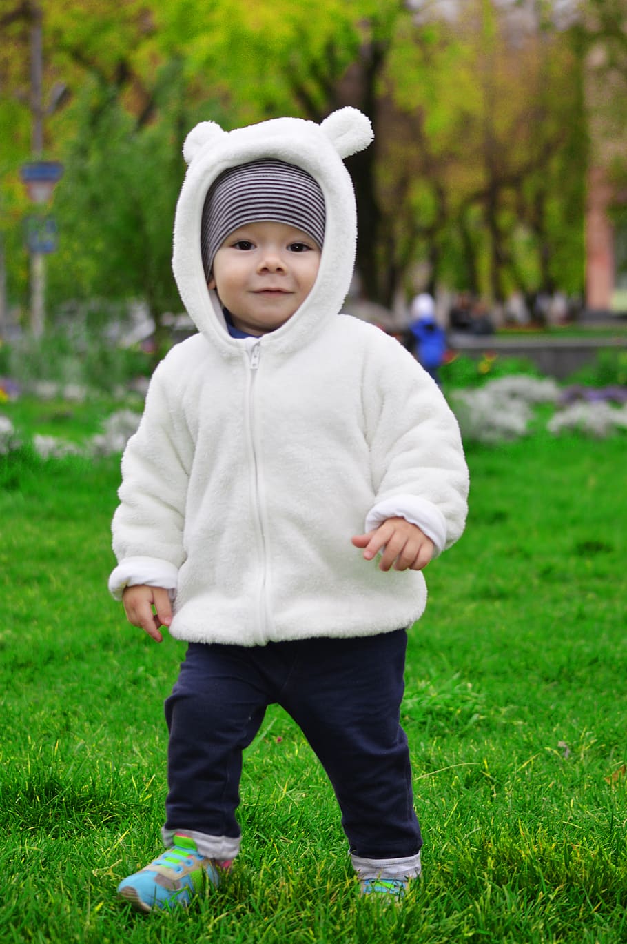 funny kid, child plays, happy child, a happy childhood, great costume, bear jacket with ears, little boy running on the grass, boy, young, kids